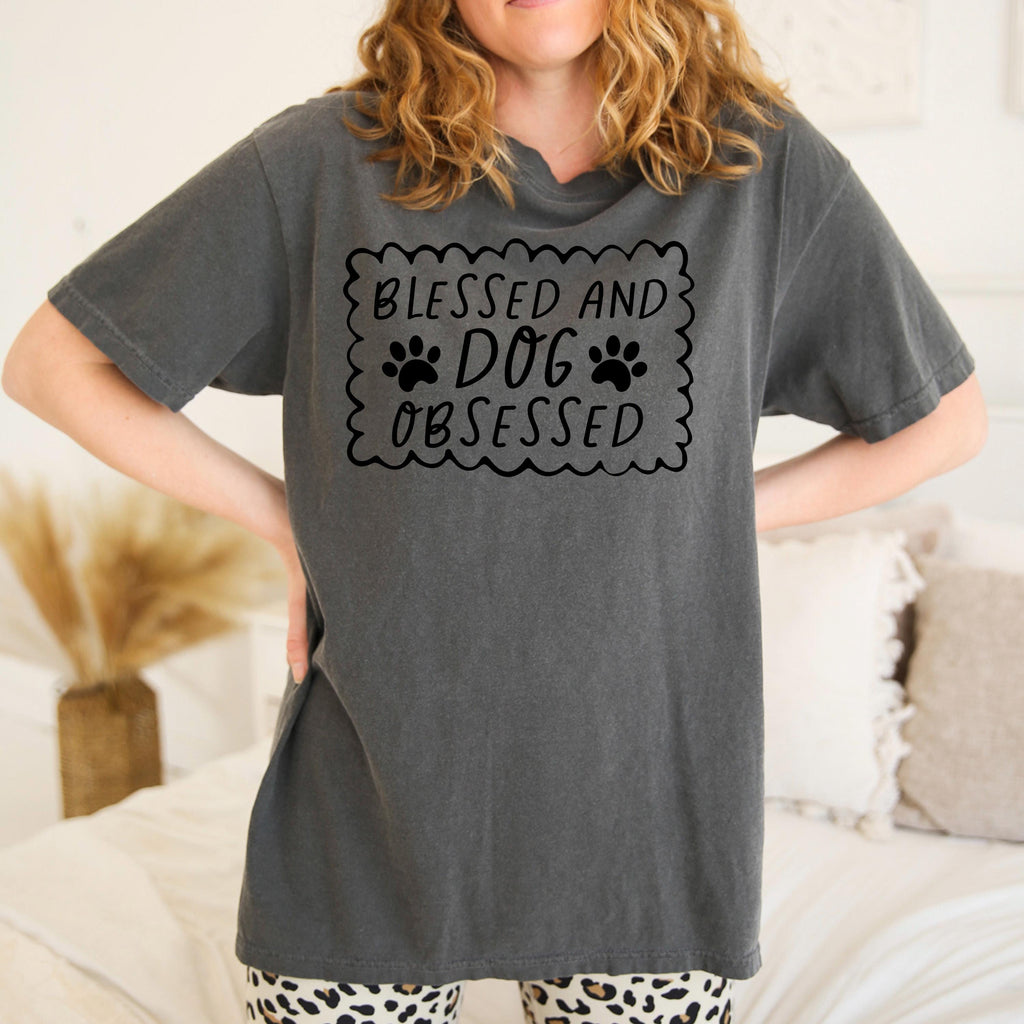 Charcoal gray short-sleeve T-shirt with “Blessed and Dog Obsessed” paw print graphic