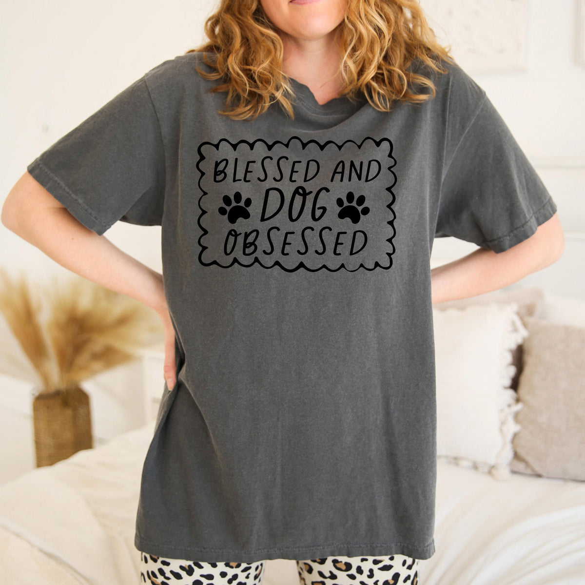 Charcoal gray short-sleeve T-shirt with “Blessed and Dog Obsessed” paw print graphic