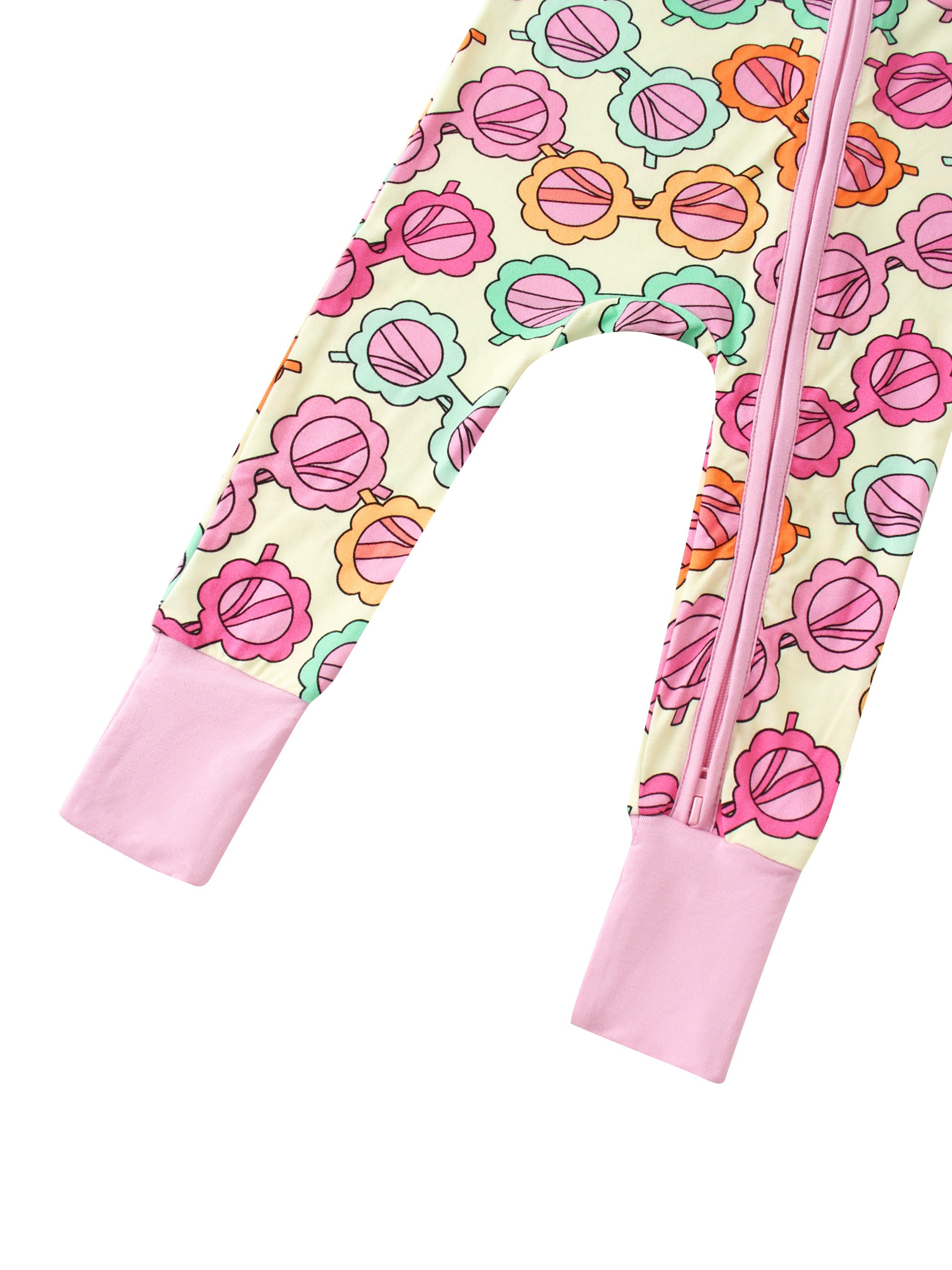 Baby long romper legs with pastel flower print, pink cuffs, and pink zipper front