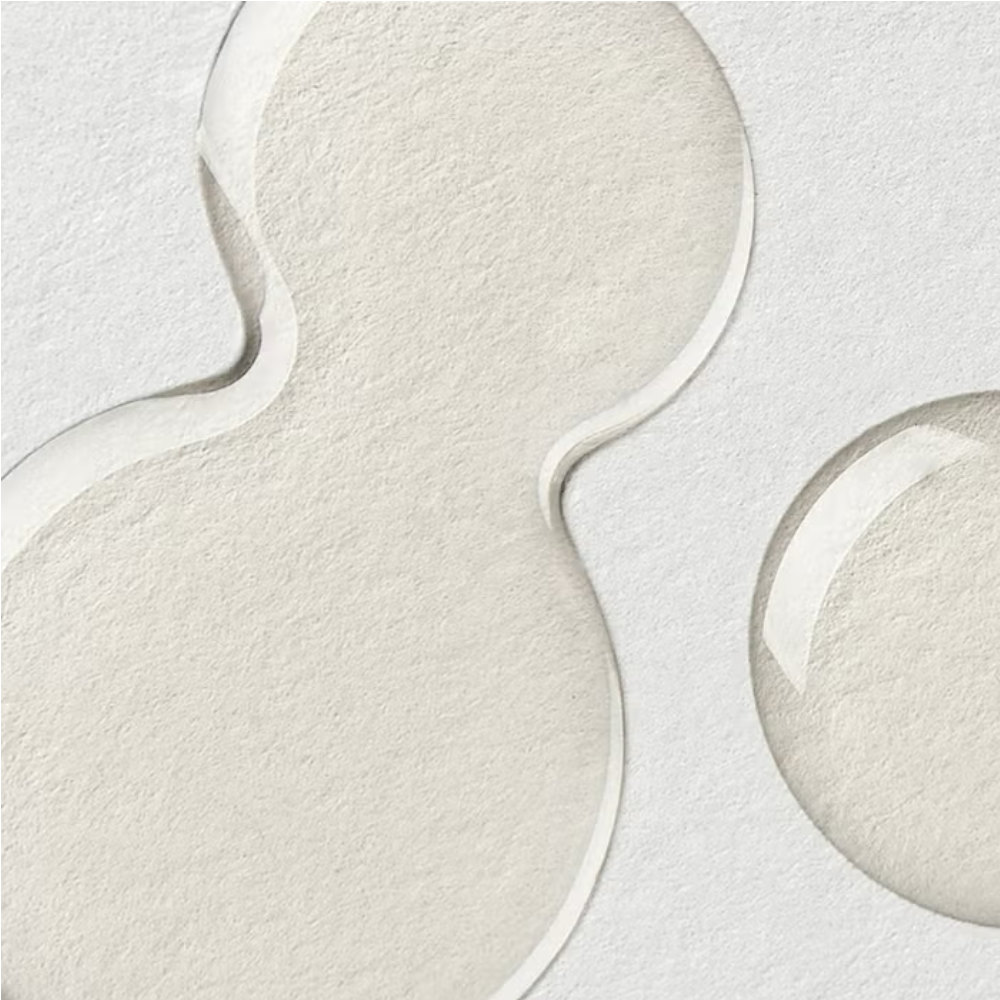 Facial oil texture with smooth, pale swirls