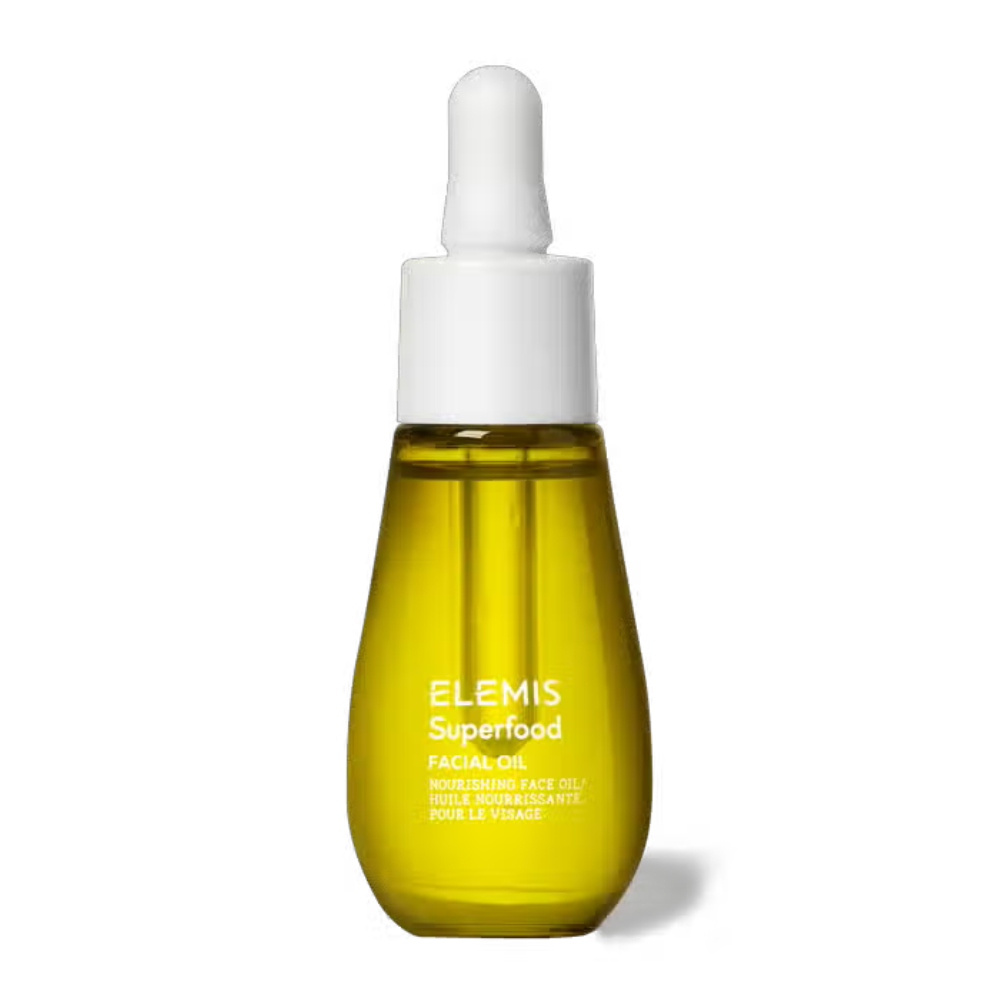 Elemis Superfood facial oil bottle, amber liquid with white dropper cap