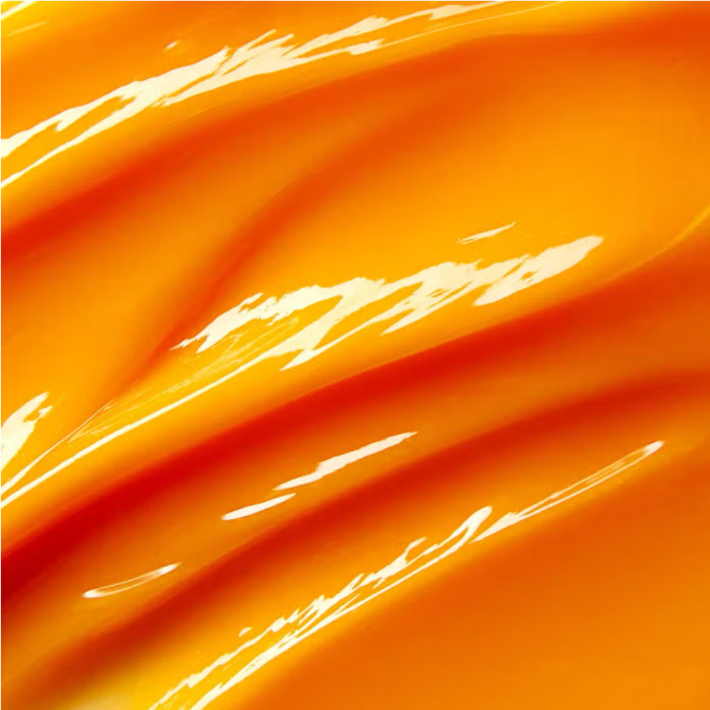 Glossy orange cleansing butter texture