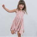Girls pink racerback dress with floral bunny print and ruffled shoulders
