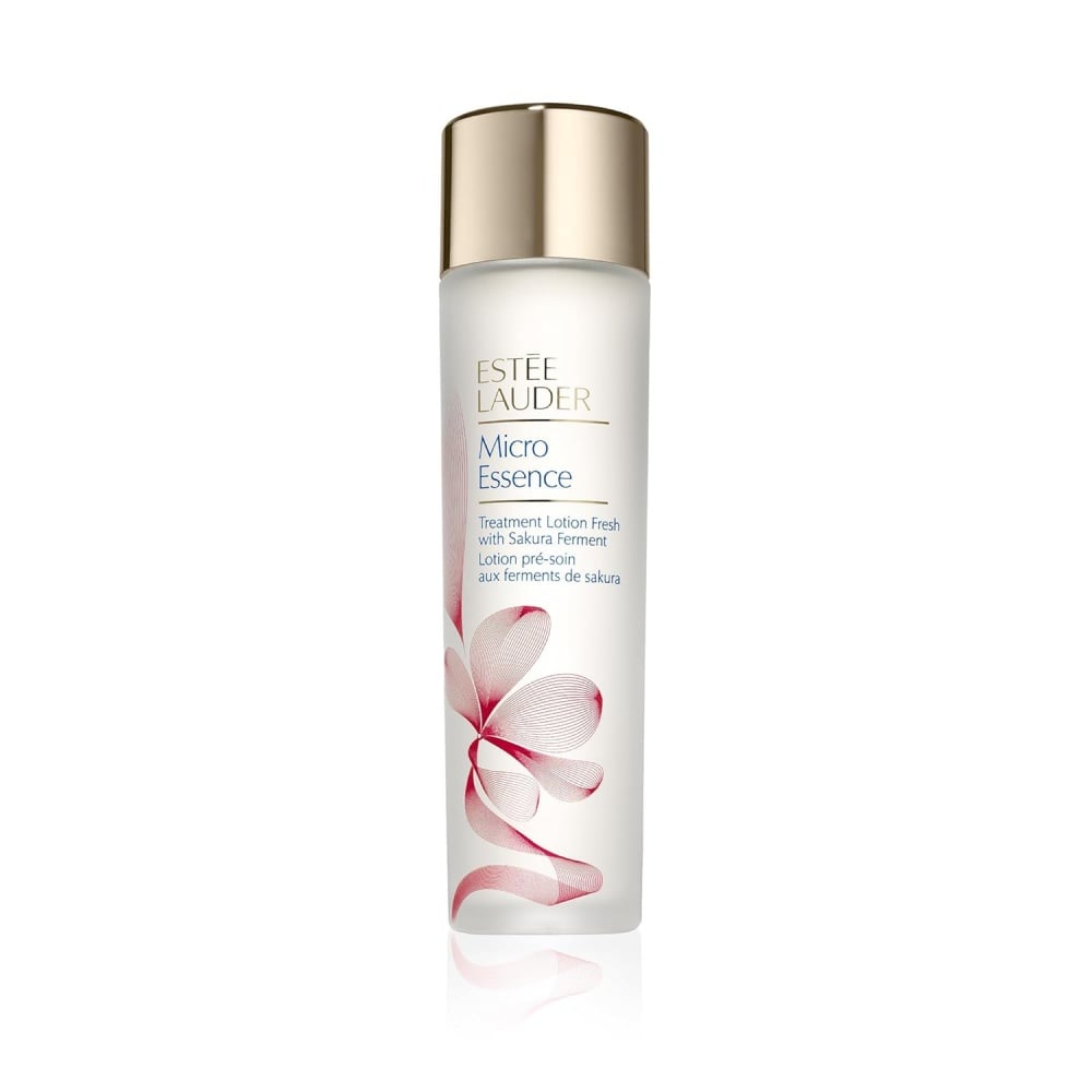 Estee Lauder Micro Essence toner lotion bottle, gold cap and sakura flower design.