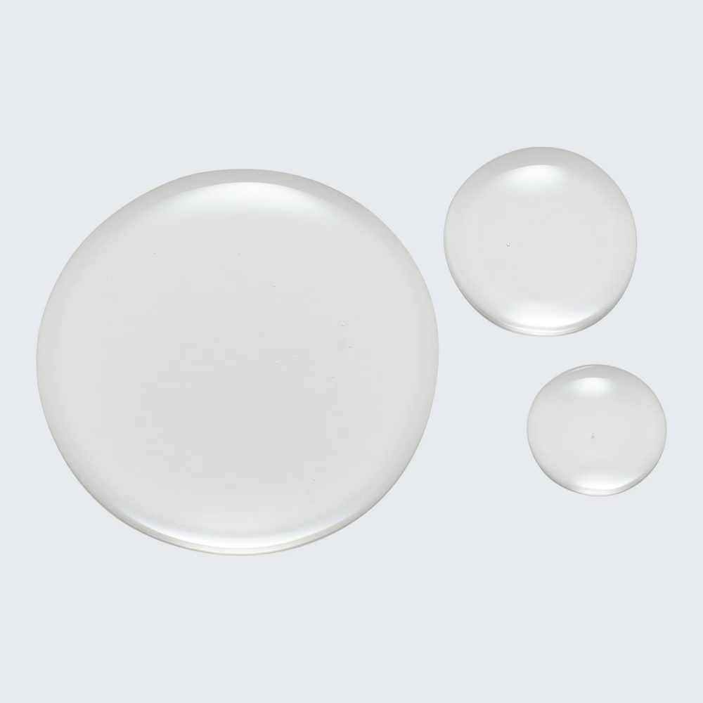 White round skincare swatch circles with smooth surface finish.