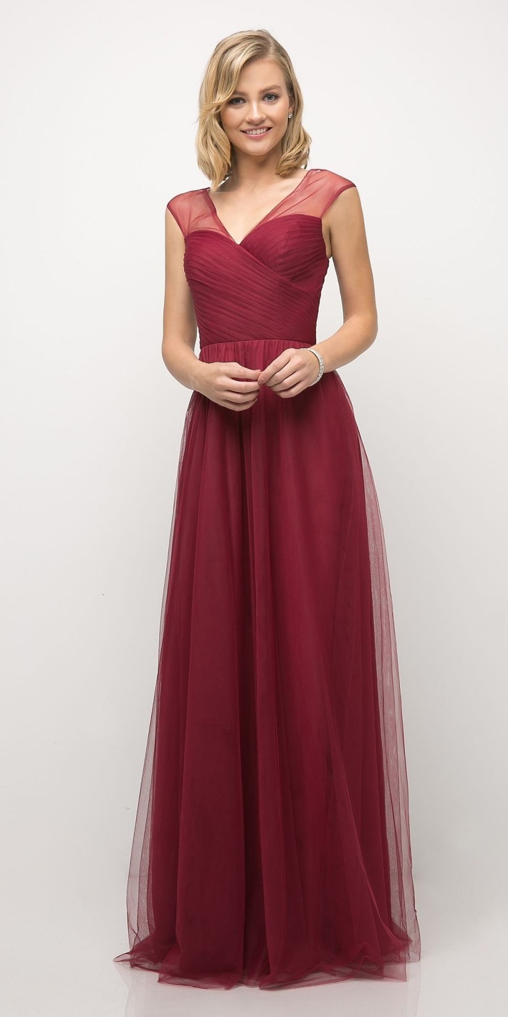 Long sleeveless formal dress with illusion V-neck bodice and flowing chiffon skirt, deep red