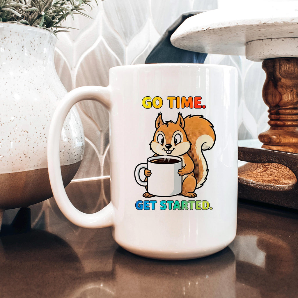 White coffee mug with squirrel graphic and text "GO TIME. GET STARTED."