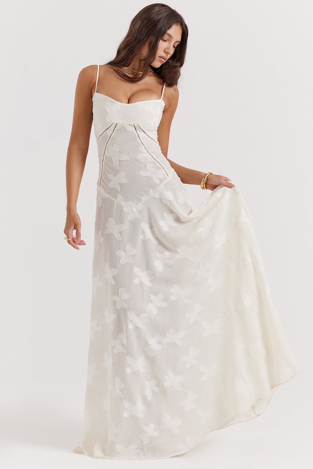 White lace suspender dress with floral appliqué, square neckline, long flowing skirt