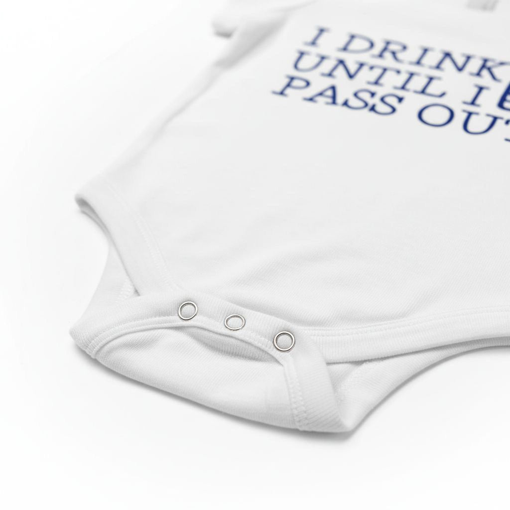 White baby bodysuit close-up with snap buttons and blue slogan print