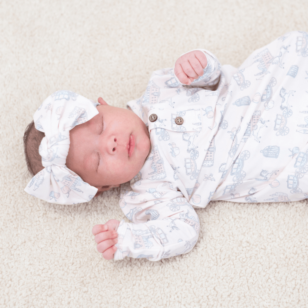 Knotted baby gown with all-over cartoon print, button-front, long sleeves