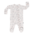 Ruffle footie baby pajamas, light patterned one-piece with front zipper and enclosed feet.