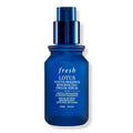 Blue glass AHA resurfacing serum bottle with spray pump