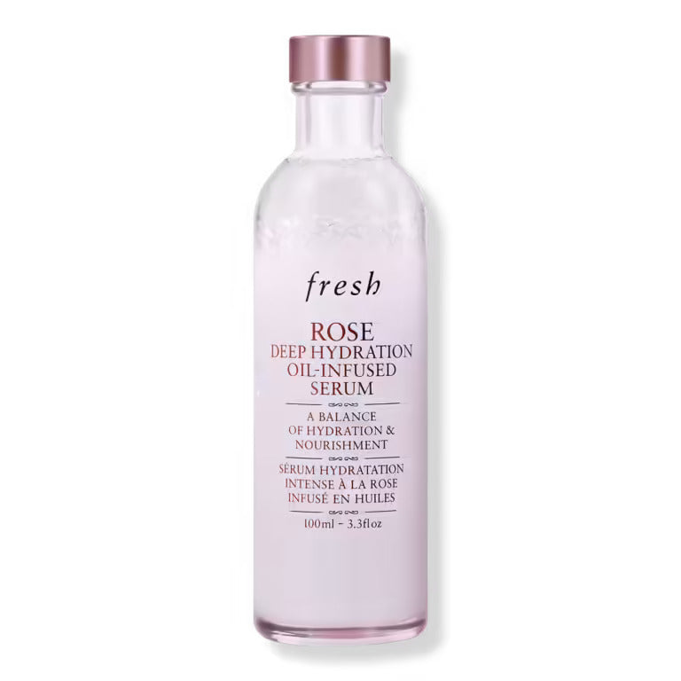 Fresh rose deep hydration oil-infused serum bottle with rose-gold cap, glass