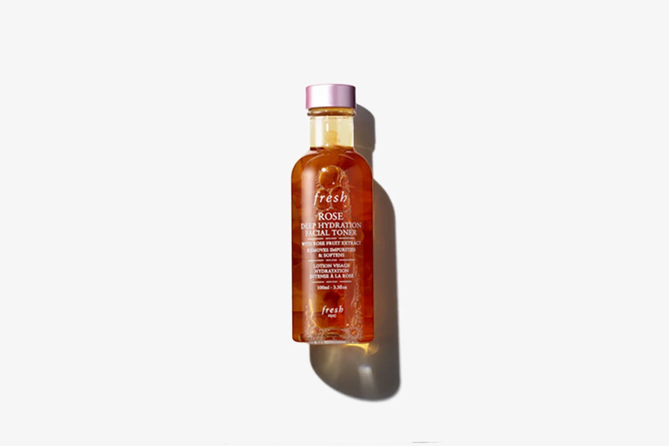Rose deep hydration facial toner bottle, amber liquid, pink cap, Fresh logo