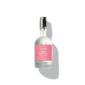 Eau de parfum bottle with clear glass, silver sprayer, pink label