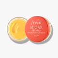 Hydrating lip balm in round tin, mango yellow balm