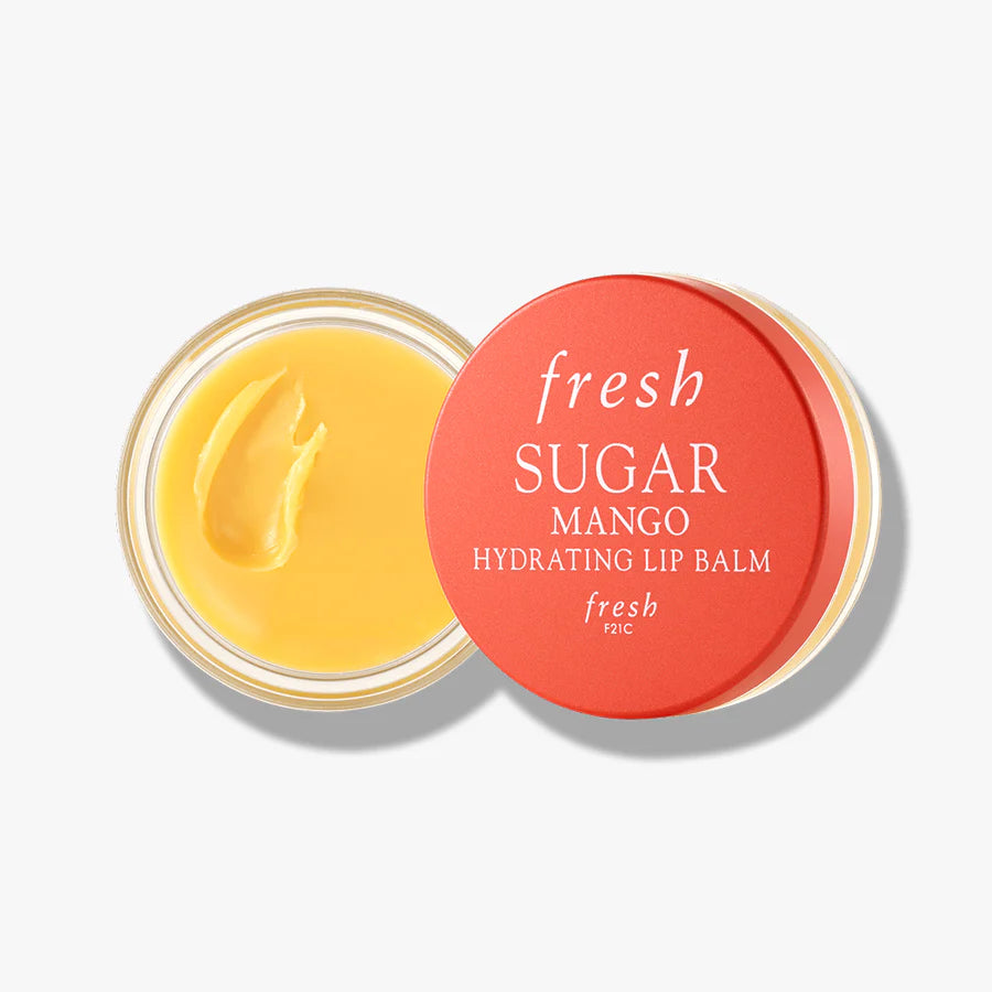 Hydrating lip balm in round tin, mango yellow balm