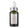 Fresh vitamin face serum bottle, dark glass with silver cap and label