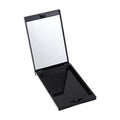 Surratt Beauty eyeshadow palette case, open with mirror and dark divided pans