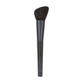 Sculpting makeup brush with dark bristles and tapered dark handle