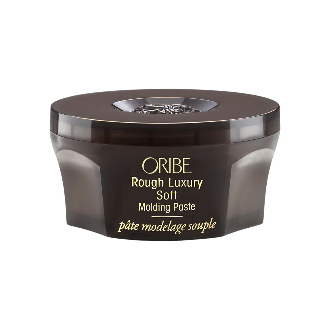 Oribe Rough Luxury Soft Molding Paste jar with brown translucent container and silver lid