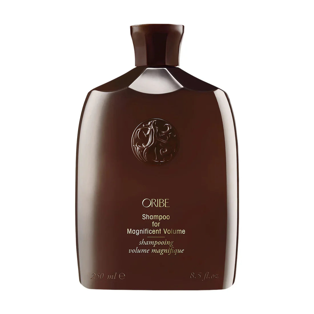 Oribe shampoo bottle, dark brown with white label and cap, 8.5 oz