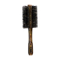 Oribe large round brush with black bristles and patterned brown handle