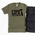 Olive unisex T-shirt with "GRANDPA LIFE" and "TOTALLY NAILED IT" graphic print