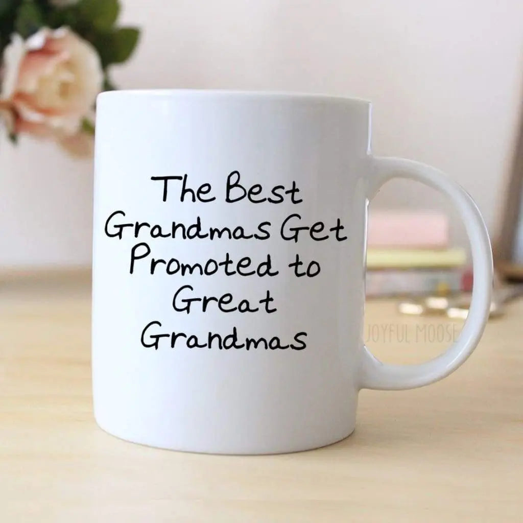 White coffee mug with “The Best Grandmas Get Promoted to Great Grandmas” text