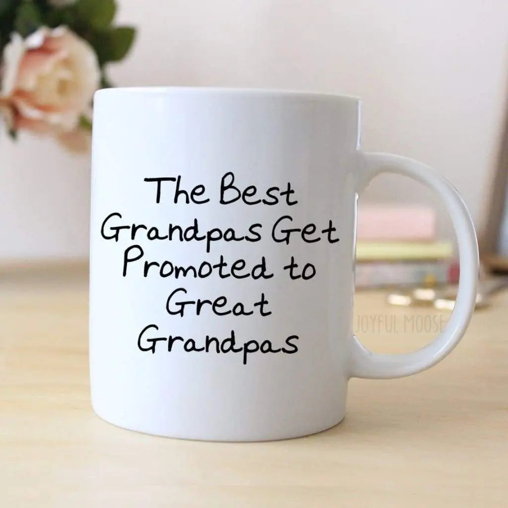 White coffee mug with black quote text: 'The Best Grandpas Get Promoted to Great Grandpas'