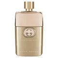 GUCCI Guilty Pour Femme Eau de Parfum bottle with gold cap and gold-toned glass