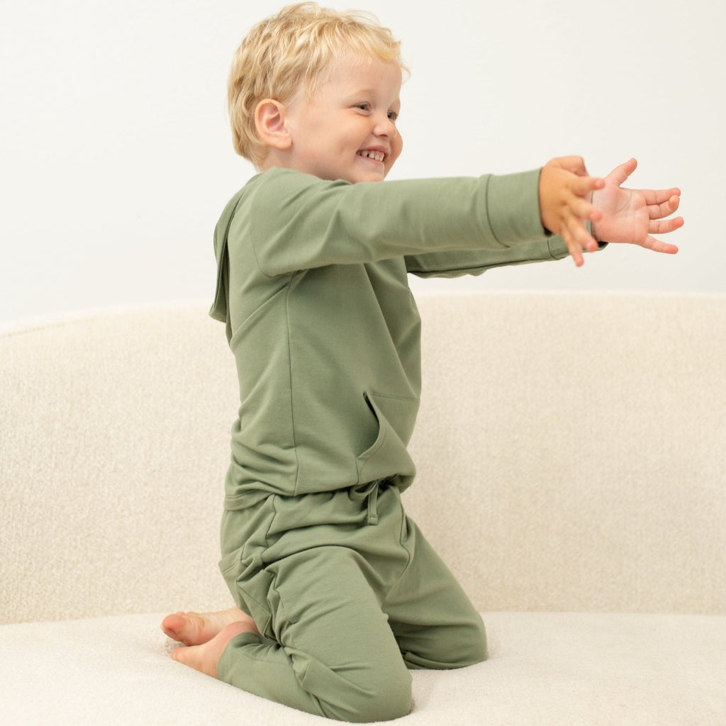 Kids' hooded jogger set in army green, side view with hoodie and tapered joggers