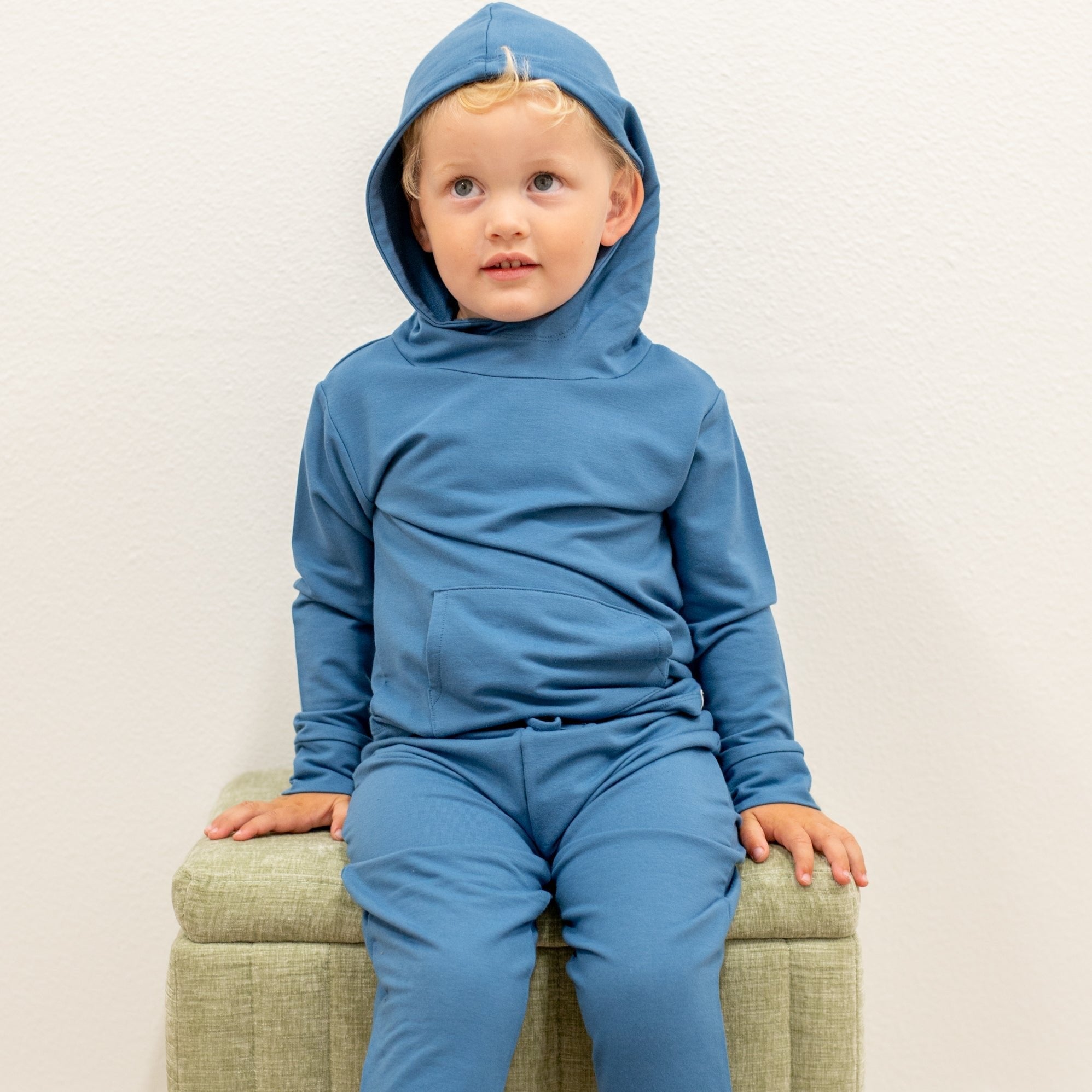 Kids blue hooded jogger set, front view of hooded top with matching jogger pants