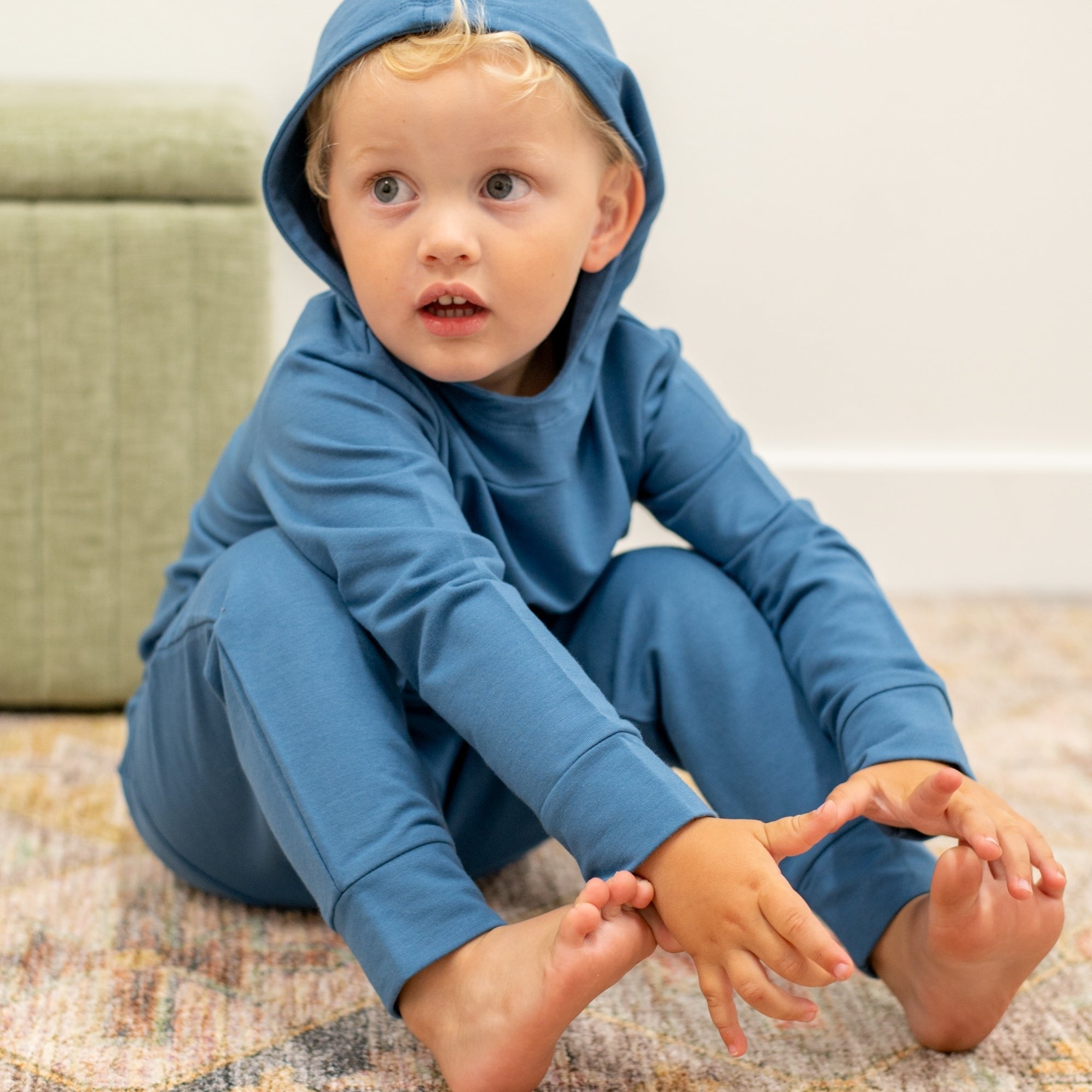 Kids blue hooded jogger set close-up, hooded top with cuffs and jogger legs