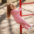 Carnation pink hooded jogger set on child: pink hoodie and matching jogger pants