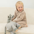 Taupe hooded jogger set on child: long-sleeve hoodie and cuffed jogger pants