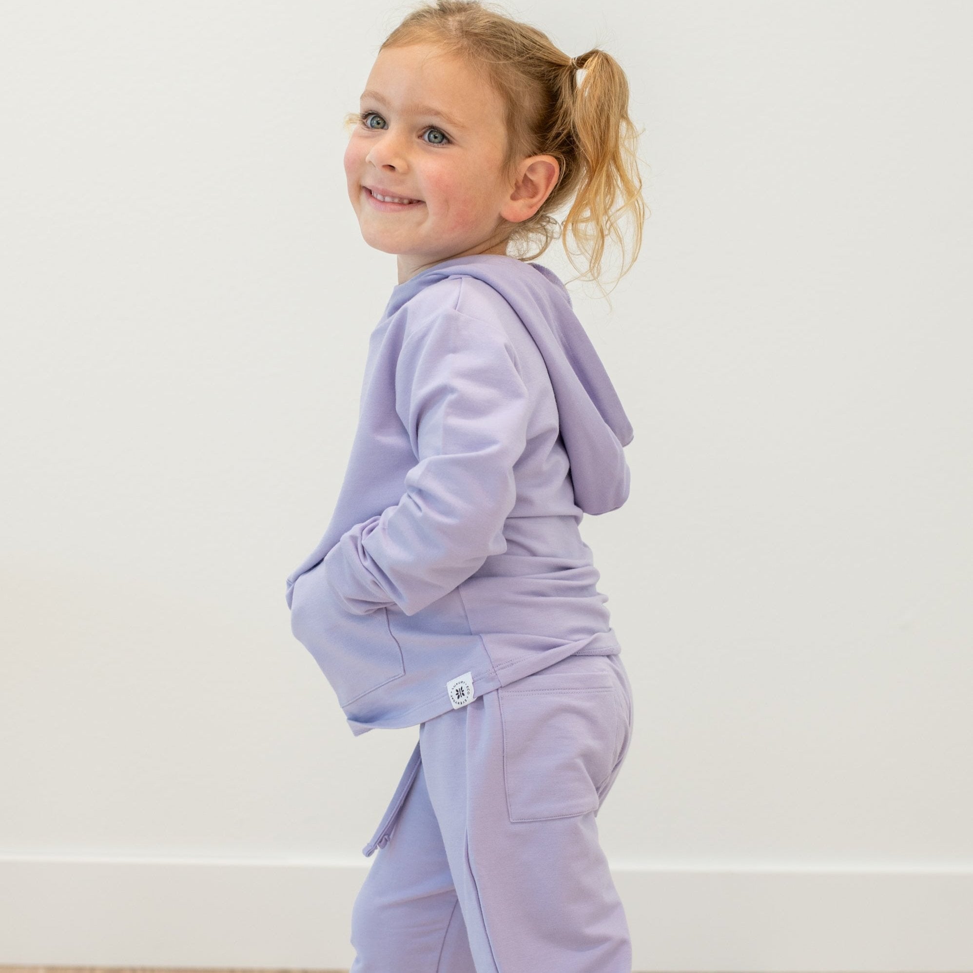 Kids lavender purple hooded jogger set, front view with drawstring jogger waist