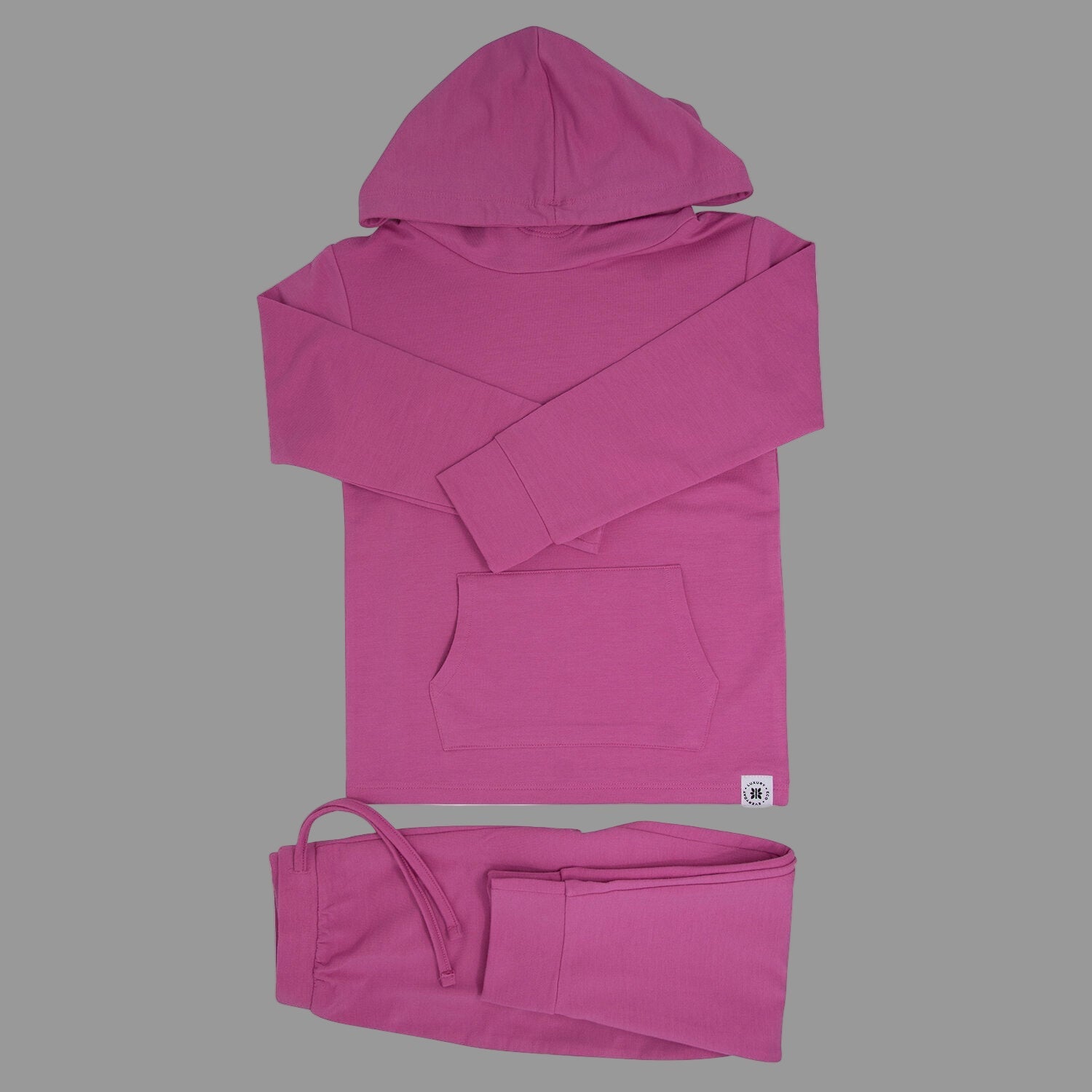 Raspberry rose hooded jogger set laid flat: hoodie top and jogger pants with elastic waist