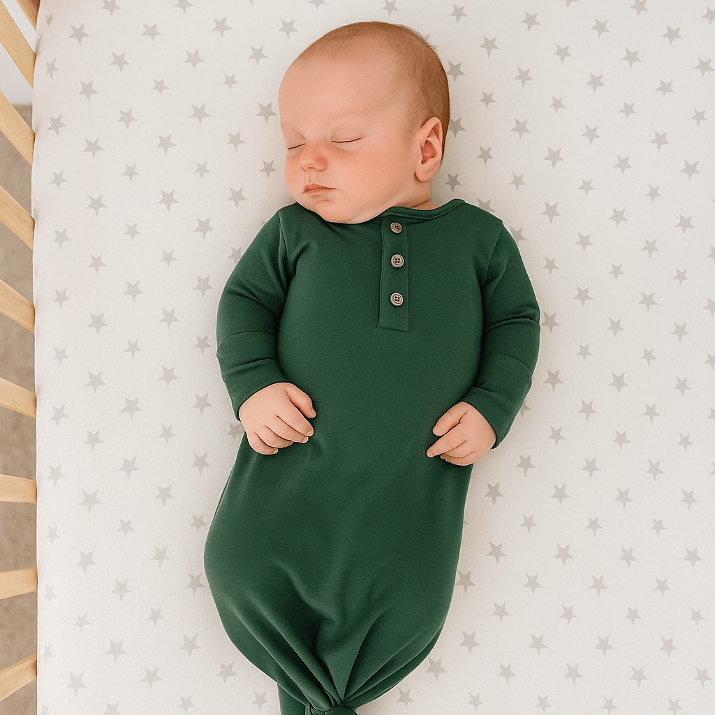 Hunter green knotted gown for baby boy with long sleeves and button placket