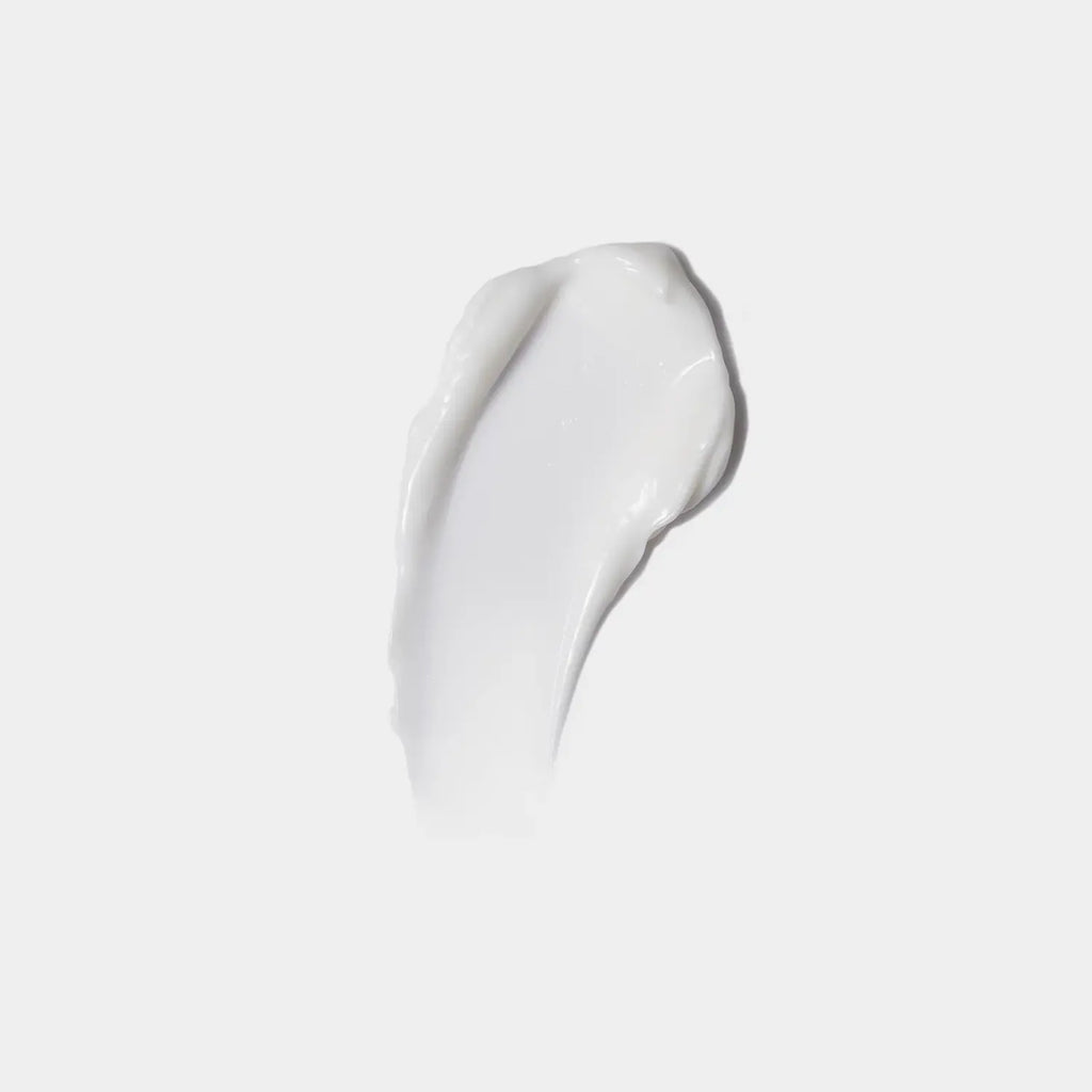 Cream cleanser dollop, thick white cream texture