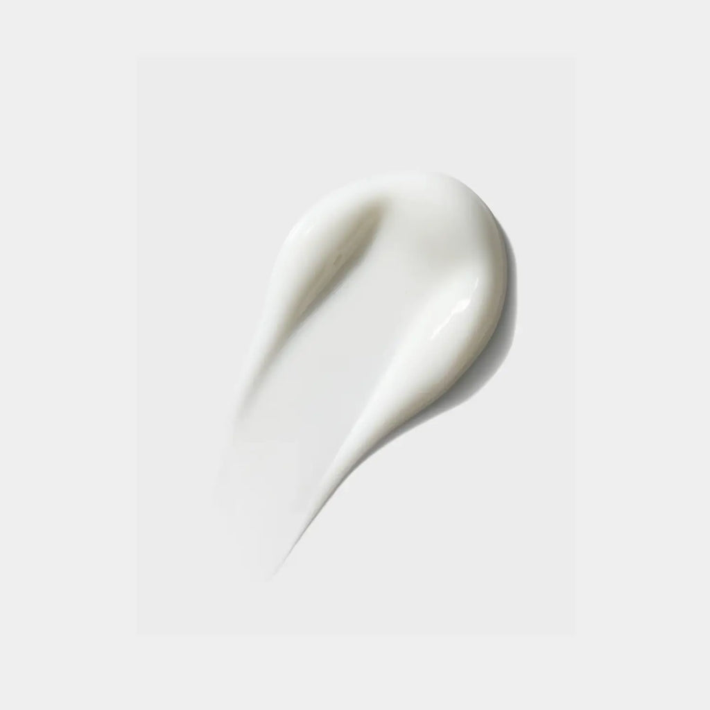 iS Clinical Moisturizing Complex cream swatch, glossy white dollop