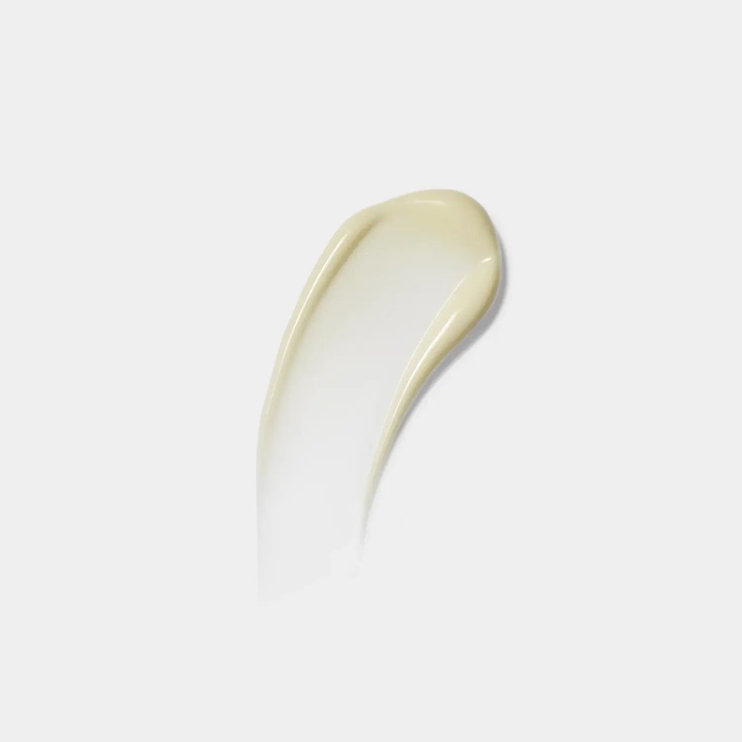 Creamy retinol emulsion texture swatch in pale beige