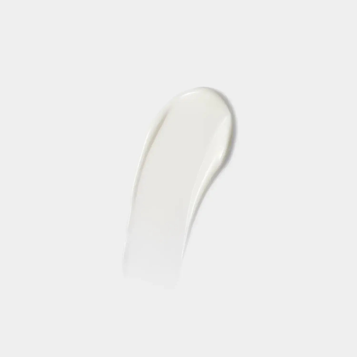 Smooth white balm smear, glossy texture