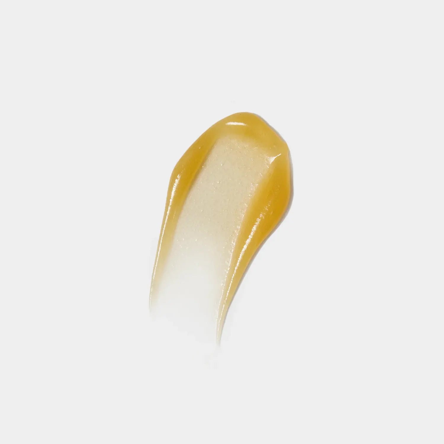 Honey-yellow cleanser gel swatch with creamy swirl texture