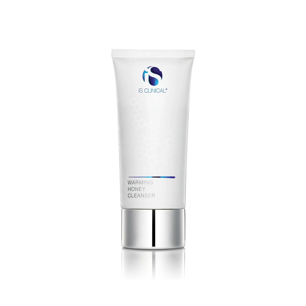 iS Clinical Warming Honey Cleanser tube, white with silver base and blue logo
