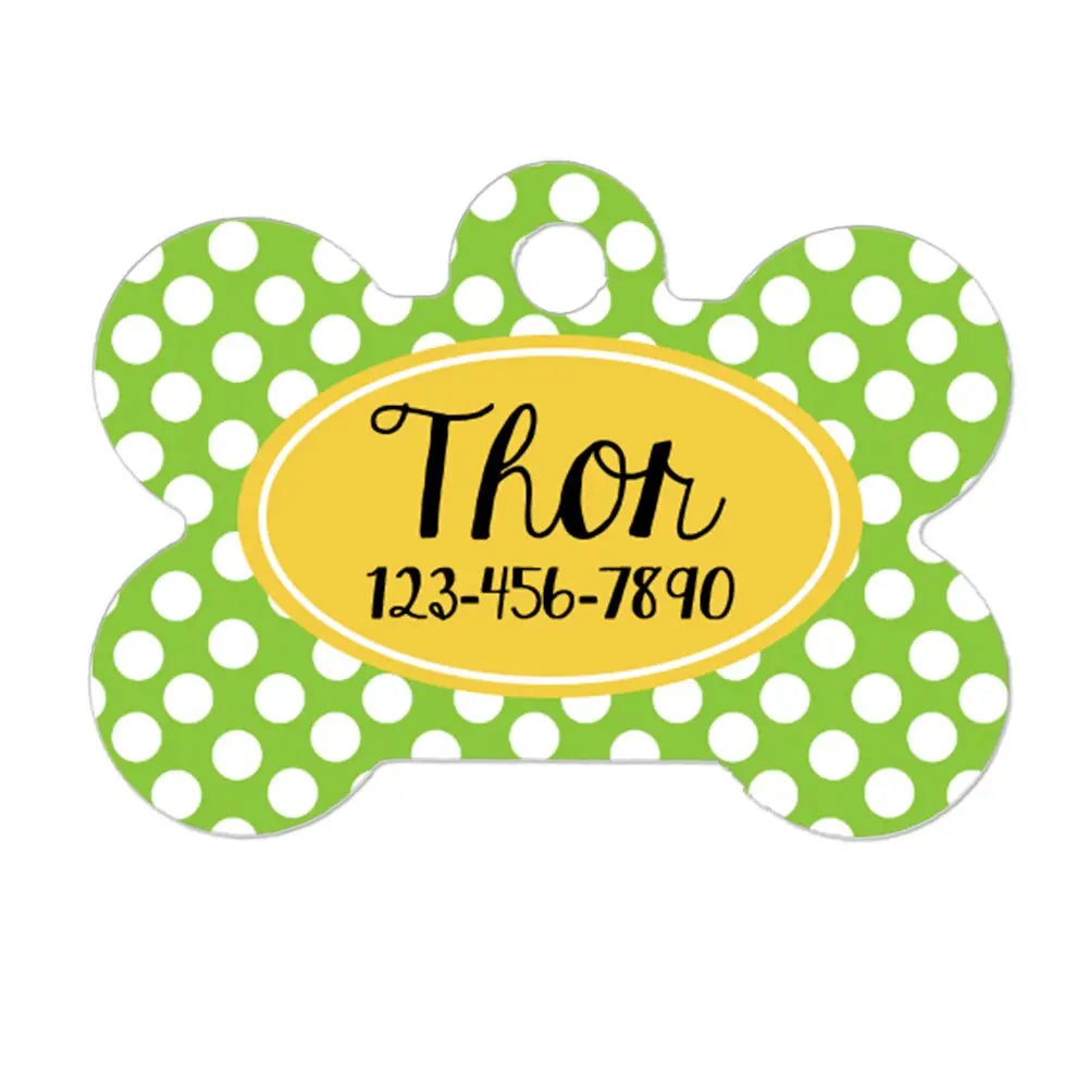 Custom bone-shaped pet ID tag with lime green polka dots and yellow name plate
