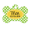 Custom bone-shaped pet ID tag with lime green polka dots and yellow name plate