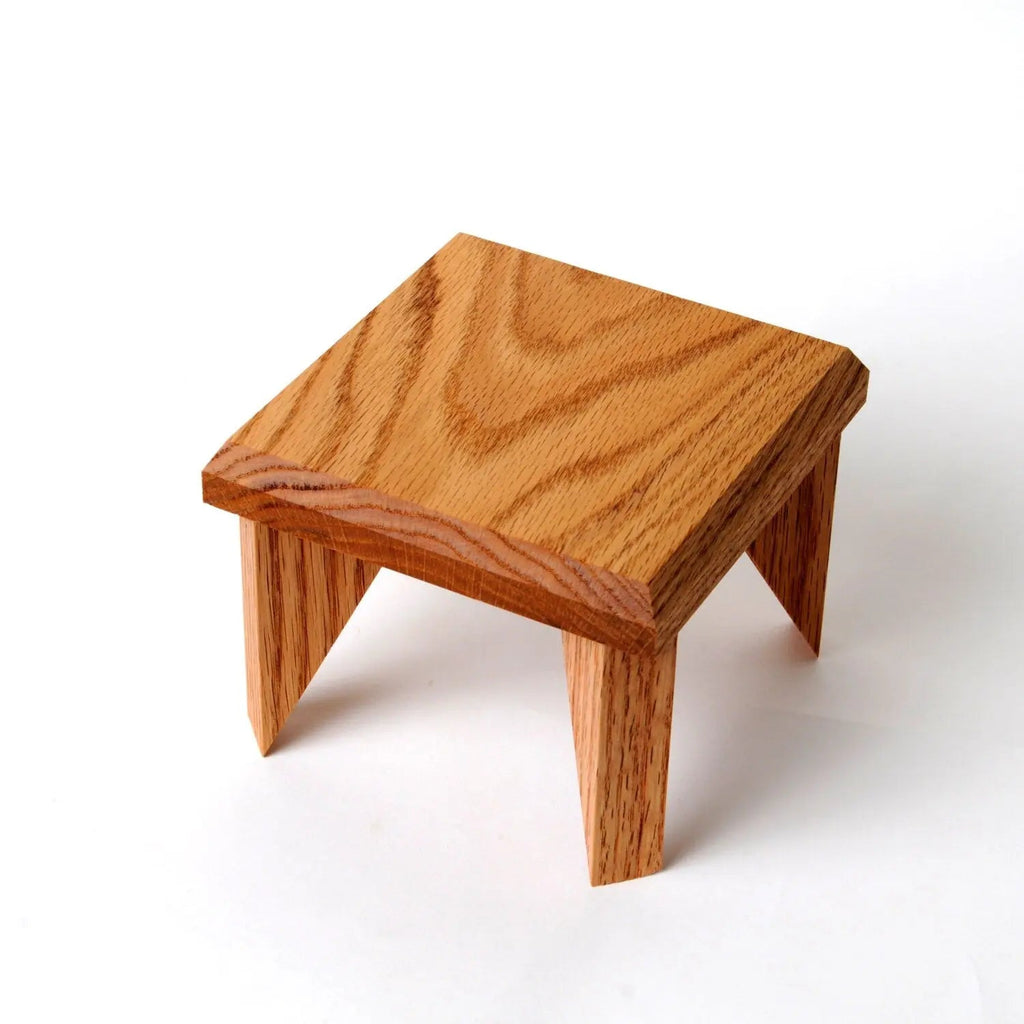 Light oak wood geometric plant stand with square top and three angled legs