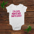 White newborn short-sleeve bodysuit with pink text slogan at the center front
