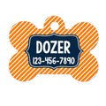 Orange bone-shaped dog tag with blue ID panel: DOZER and 123-456-7890